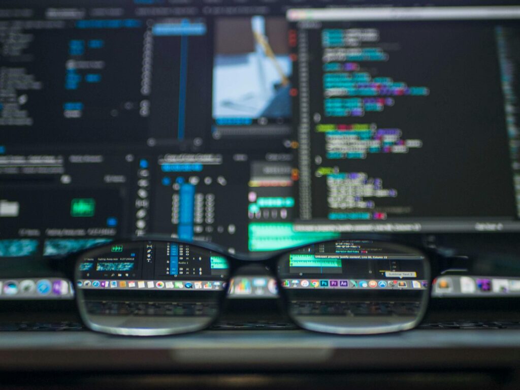 Google Tech Masons showcasing cloud computing, data storage, and AI capabilities through code and technology-focused visuals on a computer screen.