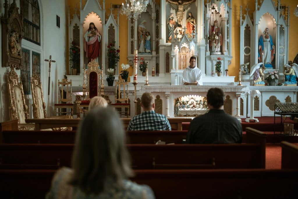 Congregants attending a service at the Church of the Holy Spirit, with the priest delivering a sermon in a beautifully adorned sanctuary, reflecting the church's dedication to faith and community.